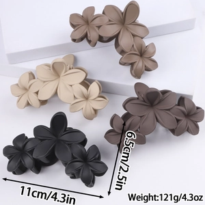 Matte finish frangipani flower hair claws in black, beige, coffee, and light brown colors