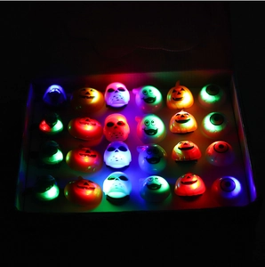 Halloween LED rings set featuring glowing pumpkin ghost and skull designs in a display box