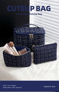 Three-piece dark blue tweed cosmetic bag set with gold zippers and silk lining