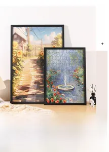 Modern black wooden jigsaw puzzle frame displayed in a cozy home interior setting