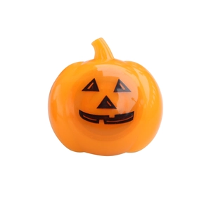 Glow-in-the-dark Halloween pumpkin ring toy made of polished orange plastic for kids