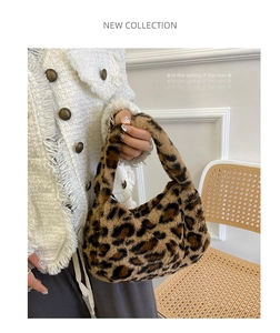 Close-up of leopard print faux fur handbag with soft texture and matching handle