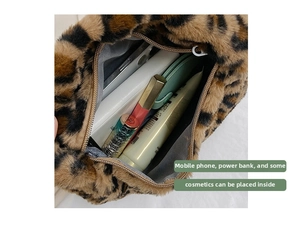 Top view of leopard print plush bag interior showing spacious storage for daily items