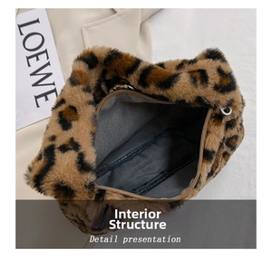 Macro detail of faux fur leopard print bag showing metal zipper and gray fabric lining