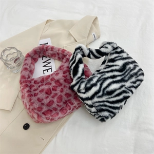 Plush leopard and zebra print shoulder bags in soft faux fur for autumn and winter fashion
