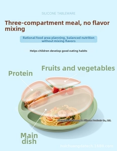 Three-compartment forest green silicone baby plate showing food portioning and separation