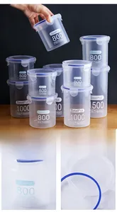 Detail of airtight plastic food containers with blue seals and multiple size options