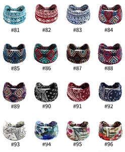 Collection of 16 wide elastic headbands with paisley, geometric, and floral print patterns