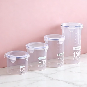 Set of 4 transparent food storage containers with airtight white locking lids in various sizes