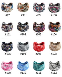 Collection of 16 printed stretch sports headbands with various ethnic and paisley patterns