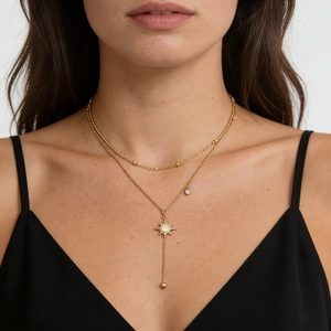 Double-layered gold titanium steel necklace with star pendant and pearl-like inlay