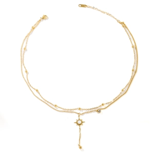 Double-layered 18k gold plated titanium necklace with sunburst pendant and beads