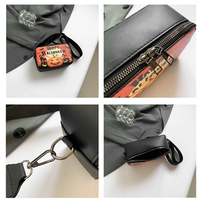 Detail view of Halloween square bag with pumpkin prints and sturdy silver-tone zippers