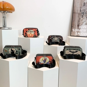 Halloween crossbody bag collection with diverse festive patterns and wide shoulder strap