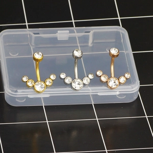 Three-piece stainless steel belly rings set with five zircons in gold, silver and rose gold