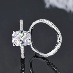 Close-up of S925 sterling silver ring set with oval cut zircon and micro pavé stones