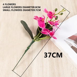 Artificial pink phalaenopsis orchid with four lifelike flower heads and green buds