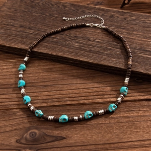 Men's hip hop beaded necklace with dark wood beads and turquoise skull charms