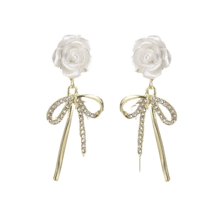 French vintage white resin camellia earrings with gold tassel bow and sparkling rhinestones