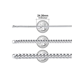 Silver curb chain necklace in three widths compared with a coin for size reference