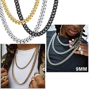 Detail showing 9mm Cuban link chains in gold, silver, and black on a male model