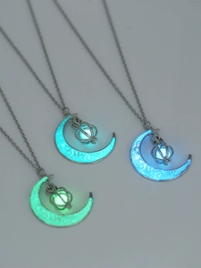 Luminous crescent moon necklaces set showing green and blue glow effects in the dark