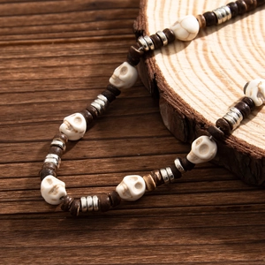 Handmade men's hip hop skull beaded necklace with dark wood beads and silver accents