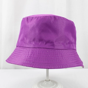 Detail of a purple polyester bucket hat featuring reinforced stitching on the brim edge