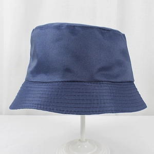 Detailed view of navy blue polyester bucket hat with reinforced stitching on the brim
