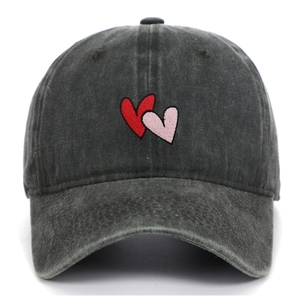 Detail of heart embroidery on vintage washed dark grey cotton baseball cap for women