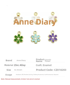 Detail of small colorful flower charms made of zinc alloy with enamel