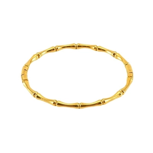 Elegant gold bamboo joint bangle made of high-quality stainless steel on white background