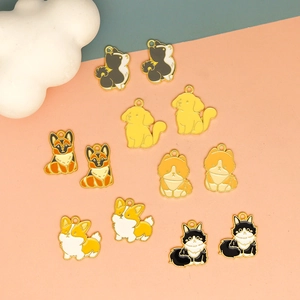 Detailed view of various colorful enamel cartoon dog charms for DIY keychain making