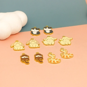 Close-up of cute enamel alloy animal charms for DIY jewelry and keychain accessories