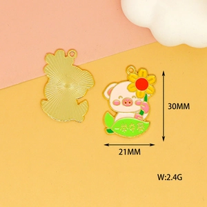 Detailed macro view of cartoon pig alloy charm with sunflower and size markings.