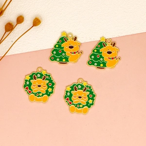 Close-up of cute Christmas reindeer enamel charms with festive tree and wreath designs