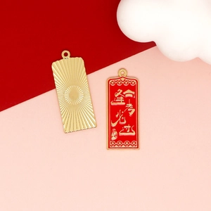 Detailed macro view showing red and gold blessing charms with Chinese exam success text