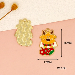 Detailed view of reindeer sock charm showing 26mm height and textured metal back