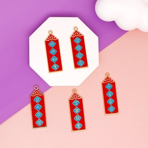 Close-up detail of five traditional Chinese style blessing pendants for DIY jewelry making