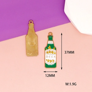 Detailed view of green alloy enamel beer bottle charm with dimensions 37mm by 12mm
