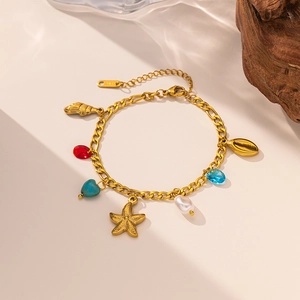 Bracelet doré étoile de mer et perles avec coquillages et pierres précieuses colorées