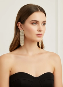 Elegant long tassel rhinestone earrings in stainless steel on female model close-up