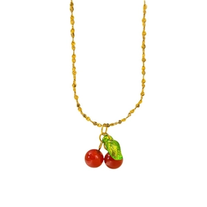 Golden twist chain necklace featuring a red cherry pendant with a transparent green leaf