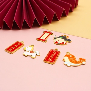 Close-up detail showing assorted lucky DIY alloy charms for handmade keychains and bags