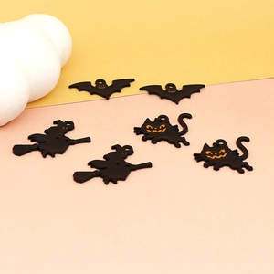Group shot of black and orange Halloween alloy charms featuring bats, witches and cats