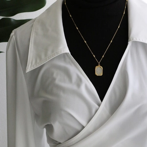 Vintage gold rose embossed rectangular pendant necklace with beaded titanium steel chain