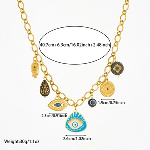 Gold stainless steel evil eye and hamsa charm necklace with bohemian multi-element pendants