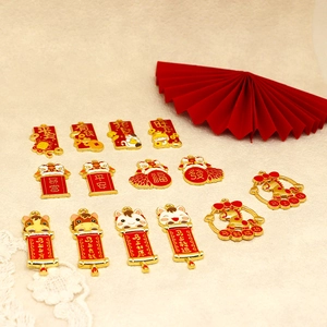 Detail view of festive Chinese New Year charms with red and gold lion dance motifs