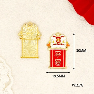 Close-up of red enamel lion dance pendant with 'Peace' engraving and specifications