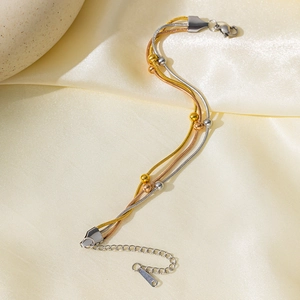 Bracelet triple rang en acier inoxydable doré rose et argenté avec perles rondes